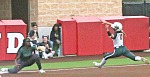 Corrinne Henderson squeezes the force out at third on a throw from center fielder Brianna Nelson. PHOTOS BY BRAIN BESCH