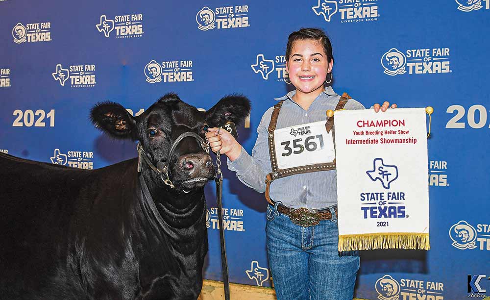 Grace Tullos of the Trinity Area 4-H  won Grand Champion Intermediate Showman at the State Fair of Texas.
