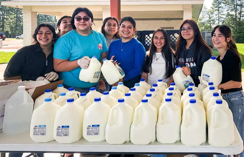 Shepherd ISD FCCLA students prepare gallons of milk for distribution. (Courtesy Photos)