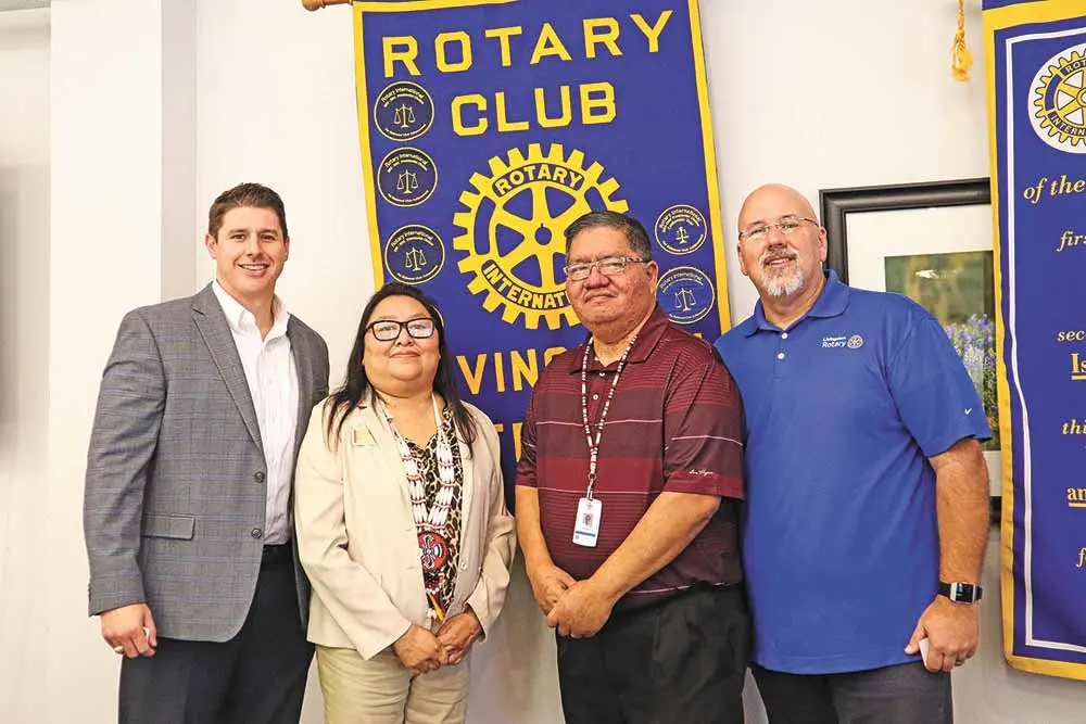 Alabama-Coushatta Tribe of Texas Members Herb Johnson Jr. and Yolanda Poncho recently presented a program to the Livingston Rotary Club. (l-r) Rotarian Kole Puckett, Poncho, Johnson and Rotary President Mike Overhoff. Photo by Emily Banks Wooten