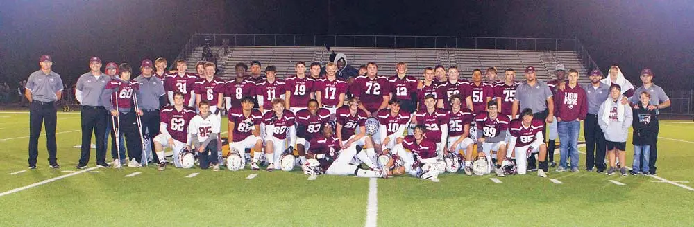 The Lovelady Lions savor the moment after winning the bi-district championship over Hull-Daisetta Friday night in Woodville.