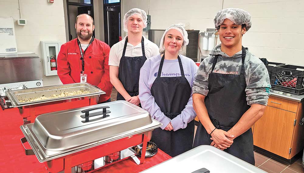 COHS Culinary Arts students from Monday night, pictured with Instructor Chef Joel Casiday, from left: Ryan Allison, Lilly Warwick, and Eddie Brown. Photo by Cassie Gregory