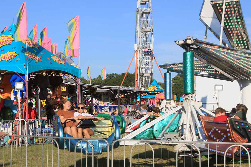 Fun was had by children of all ages on the midway during the Trinity Community Fair. )Photos by Tony Farkas/TCNS)