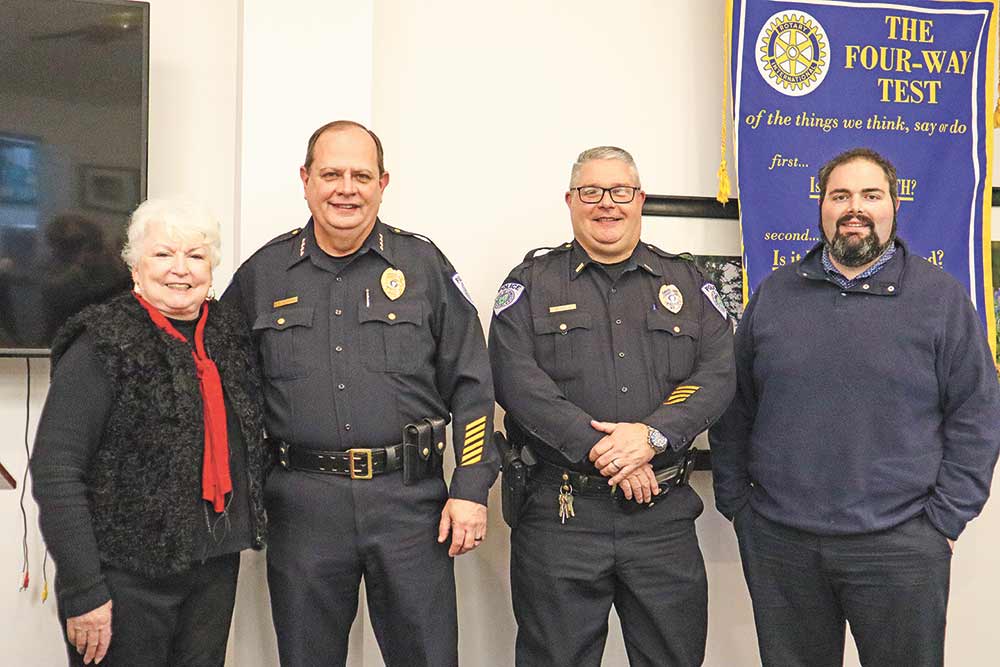 Livingston Police Chief Matt Parrish and Detective Marty Drake spoke to the Livingston Rotary Club recently, providing an update on the Livingston Police Department. (l-r) Rotarian Judy Cochran, Parrish, Drake and Rotary President Andrew Boyce.  Enterprise photo by Emily Banks Wooten