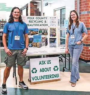 Polk County Recycling Center Manager Brian McNinch and Kari Miller, Polk County liaison for Polk County Recycling & Beautification (PCRB), participated in a College and Career Fair at Livingston High School earlier this month to spread the word about PCRB’s mission and efforts and also to seek new volunteers. Courtesy photo
