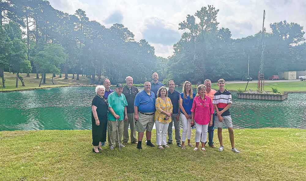 Cutline: Mayor Judy B. Cochran and City Manager Bill S. Wiggins stand with members of the Pritchard family – descendants of the Cannon family – at the dedication of Cannon Pond & Park Friday. (l-r) Cochran, Clint Miller, Col. Cannon H. Pritchard, Judson Pritchard, Ross Miller, Jason Pritchard, Vicki Miller, Jimmy Miller, Allison Settlemeyer, Pat Pritchard, Wiggins and Connor Settlemeyer. Courtesy photo