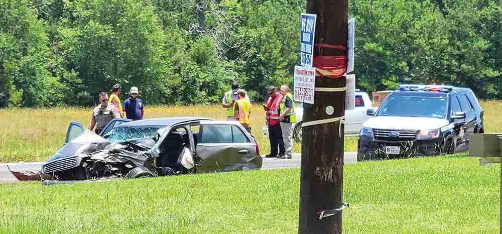 State troopers investigate a two-vehicle crash. Photo by Brian Besch