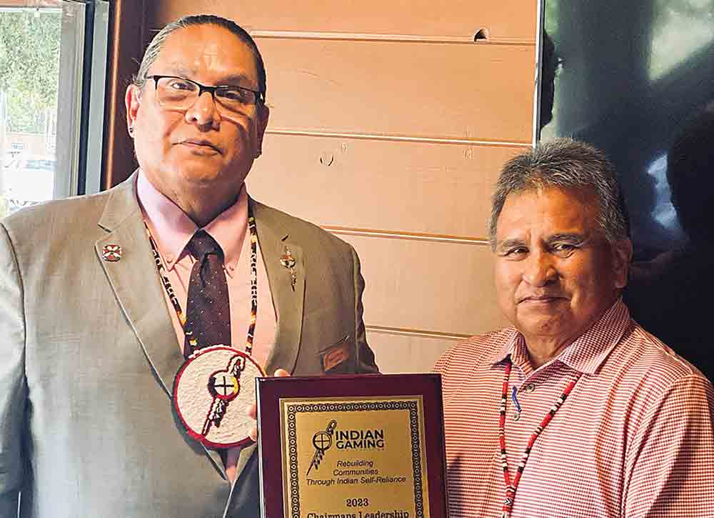 Ernie Stevens Jr., chairman of the Indian Gaming Association, recently visited the Alabama-Coushatta Tribe of Texas to express support for the tribe and applaud the success of Naskila Casino. While on the reservation, Stevens presented Tribal Council Chairman Ricky Sylestine with the 2023 Chairman’s Leadership Award for Rebuilding Communities Through Indian Self-Reliance. Courtesy photo