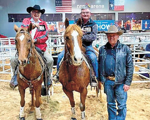 Grady Tinker (middle) and partner Raymond Martinez (right) are shown with Dave Wolfe (left), president of Ranch Sorting National Championships.