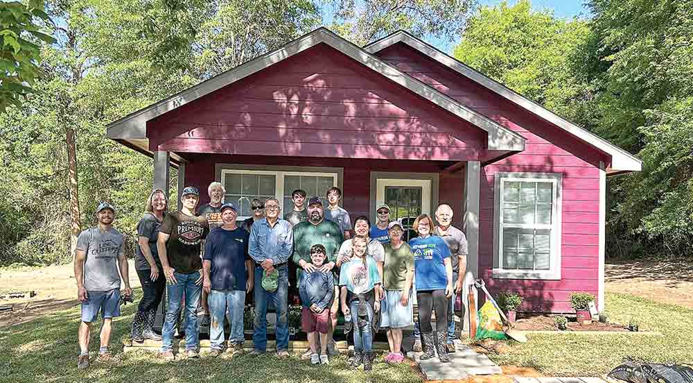 Volunteers from the Rotary Club of Livingston and Habitat for Humanity of Polk County completed a landscaping project at the 20th Habitat home in Polk County Saturday. Located at 211 Waka in Livingston, the home will be dedicated during a ceremony at 9 a.m. Saturday. Courtesy photo