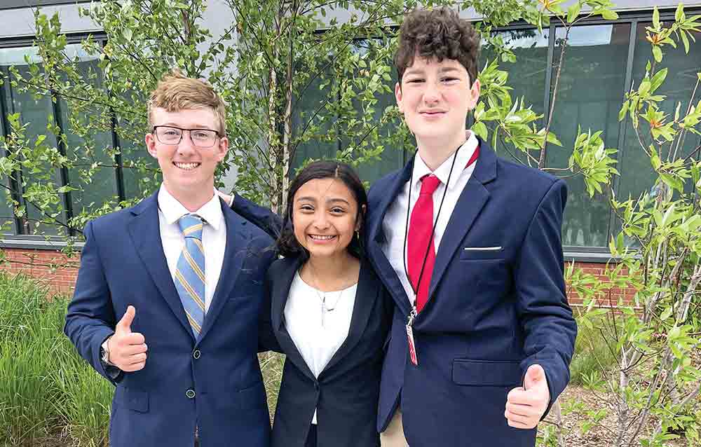 Eddie Turk, Luisa Perez-Montes and Harper Armstrong (left to right) finished in the top 10 at National History Day for their group website. COURTESY PHOTO