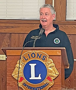 Lion Ken Jobe spoke at the Woodville Lions’ 75th anniversary meeting.  Photo by Michael G. Maness