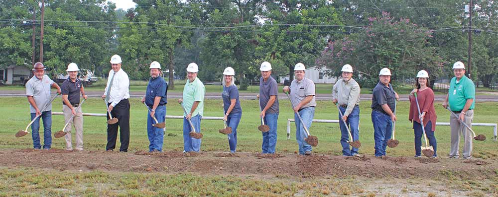 Latexo ISD officials and administrators, along with representatives of one of their contractors, the Berry and Clay commercial construction company, broke ground for the school district’s $5 million bond project last Thursday. (ALTON PORTER | HCC)