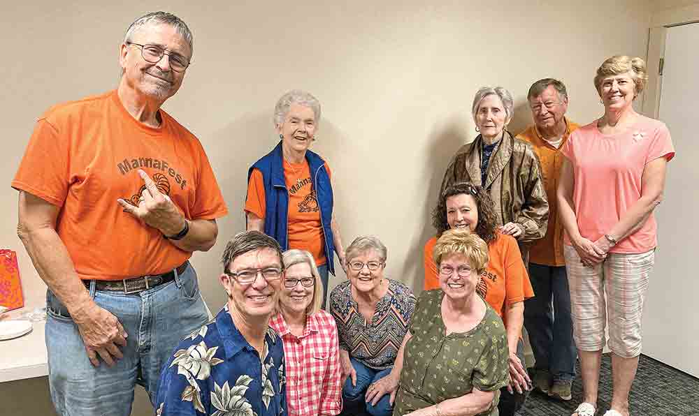 Local volunteers for MannaFest Food Pantry enjoy the time they spend with each other serving the community. Standing (l-r) Roy Norrell, Ann Stewart, Clara Lemons, Ron Cass and Dolores Rowland. Kneeling (l-r) Bill Rowland, Linda Norrell, Sandy Menefee, Marylee Westmoreland and Dawn Jander. Courtesy photo