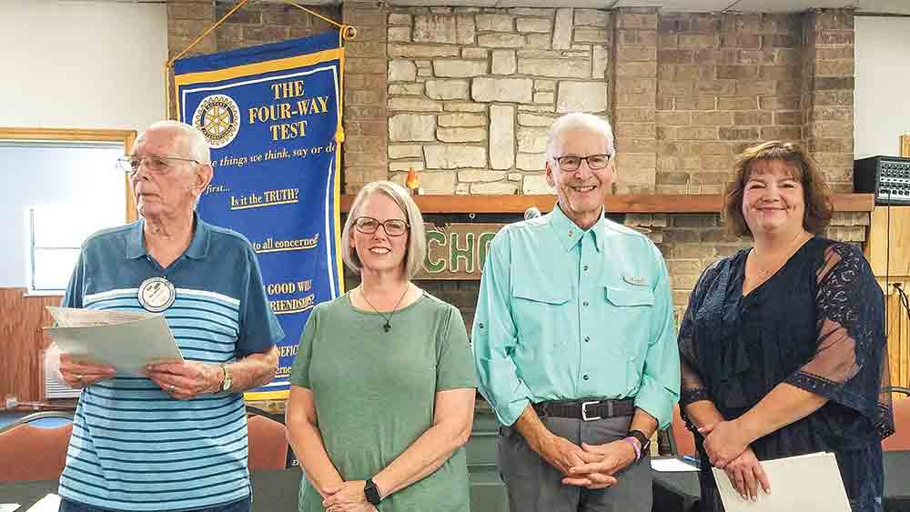 The Rotary Club of Livingston welcomed two new members – Mindy Ellis and Heidi Barnes – who were recently inducted into the local service club. (l-r) Rotarian Ray Gearing, Ellis, Rotarian Blair McDonald and Barnes.  Photo by Emily Banks Wooten