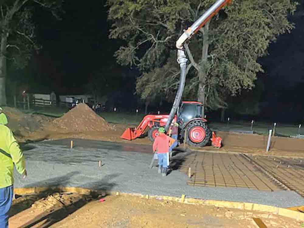 Contractors pours cement for the parking lot of the Innovation Center on Friday morning. Courtesy photo by Mark Wood