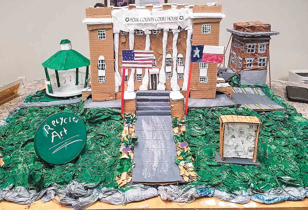 RECYCLED ART  This replica of the Polk County Courthouse, constructed completely from recyclable materials, was created last spring by Jadyn Pace, a local student. In celebration of the first anniversary of the local recycling center, Polk County Recycling & Beautification recently held a “Recycled Art Contest.” Anyone going to the recycling center during regularly scheduled days and times will be able to view the contest entries and cast a vote for People’s Choice. Winners will be announced on Nov. 15. Photo by Emily Banks Wooten