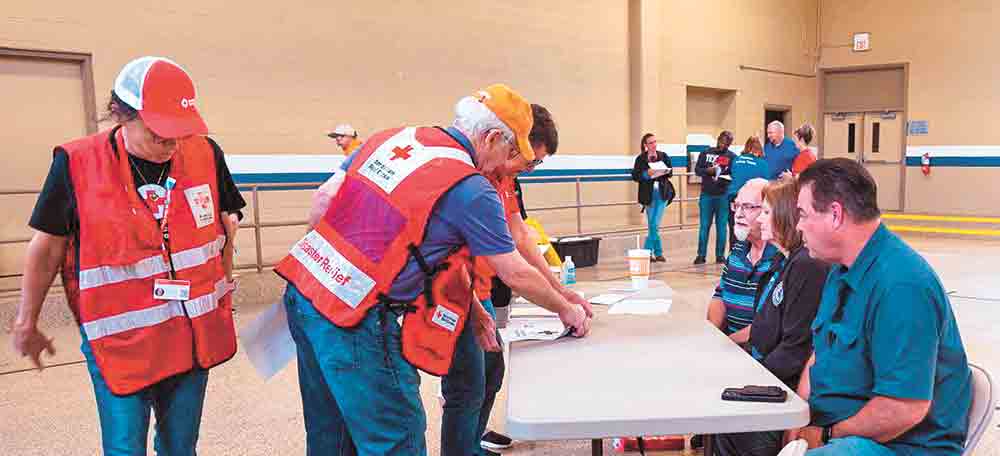 Disaster relief responders with the American Red Cross work with county employees and various first responders in a shelter simulation at the Dunbar Gym during a recent training exercise. Courtesy photo