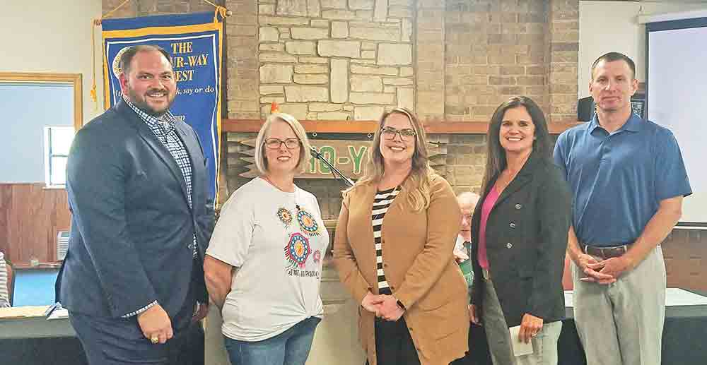The Rotary Club of Livingston recently heard about several different programs, including Faith in Practice Medical Mission, CASA of the Pines and Texas Family Care Network. (l-r) Rocky Hensarling, vice president of community-based care with Texas Family Care Network; Mindi Ellis, with Faith in Practice Medical Mission; Kecia Davis, director of intake and placement with Texas Family Care Network; Natalie Thornton, executive director of CASA of the Pines; and Rotary President Brandon Wigent. Photo by Emily Banks Wooten