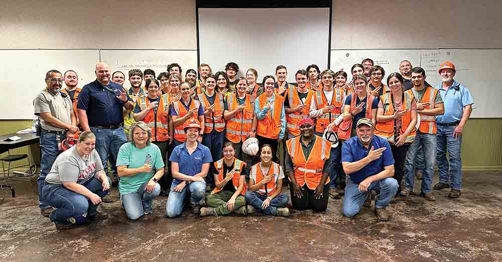 (Above) Stephen F. Austin State University forestry students tour Georgia-Pacific’s Camden Plywood plant to see first-hand how plywood is made.  