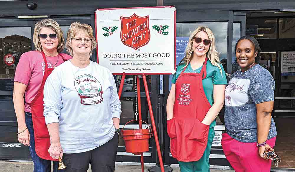 Starting the day after Thanksgiving, the Salvation Army bell ringers will be outside Walmart collecting money to assist those in need. (l-r) Sherry Middleton, Bea Ellis, Jessie Clarke and Tie Dominguez rang bells last year. Courtesy photo