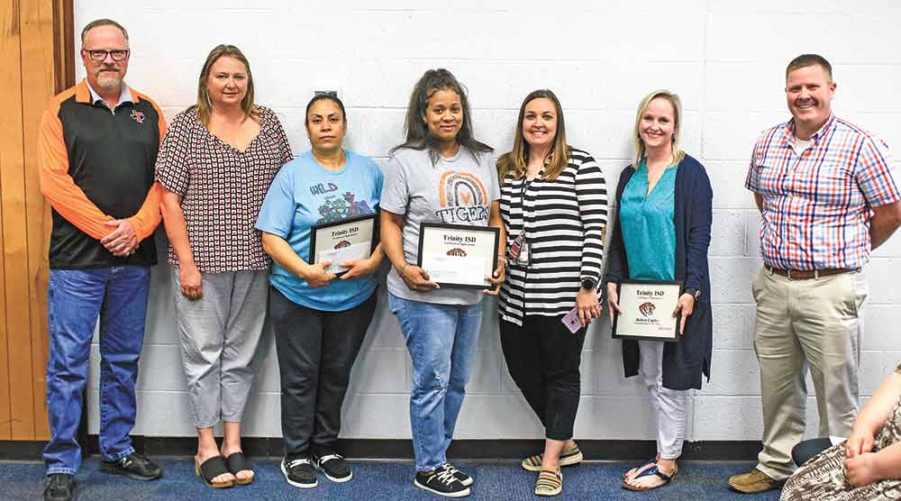 Employees of the month recognized by the Trinity ISD School Board were Robyn Copley, professional; Tahtiana Clinton, paraprofessional; and MariaLlanos, support staff.