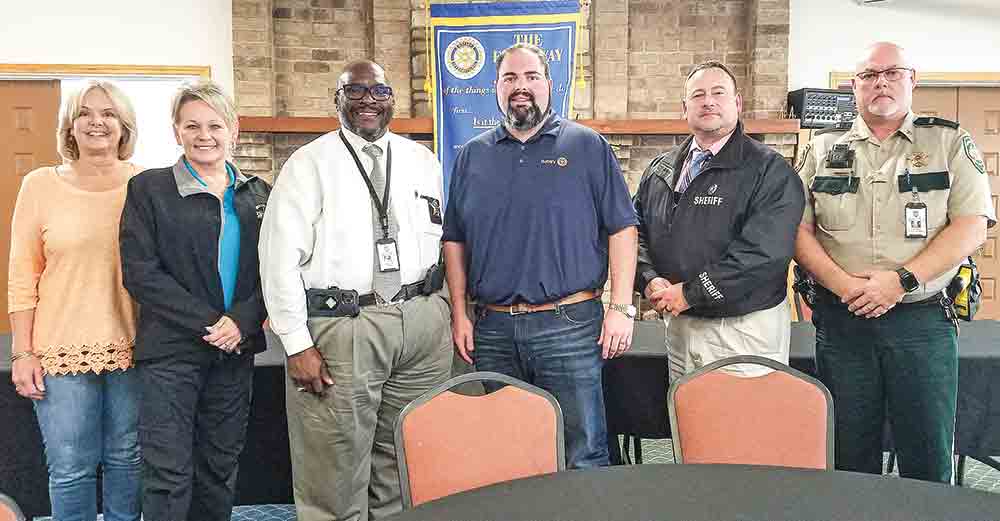 Polk County Sheriff Byron Lyons and others from his department presented a program to the Rotary Club of Livingston Thursday. (l-r) Rotarian Trina Fowlkes, Special Victims Liaison Christie Allen, Lyons, Rotary President Andrew Boyce, Cptn. Dave Sottosanti and Lt. Glenn Edwards.  Photo by Emily Banks Wooten