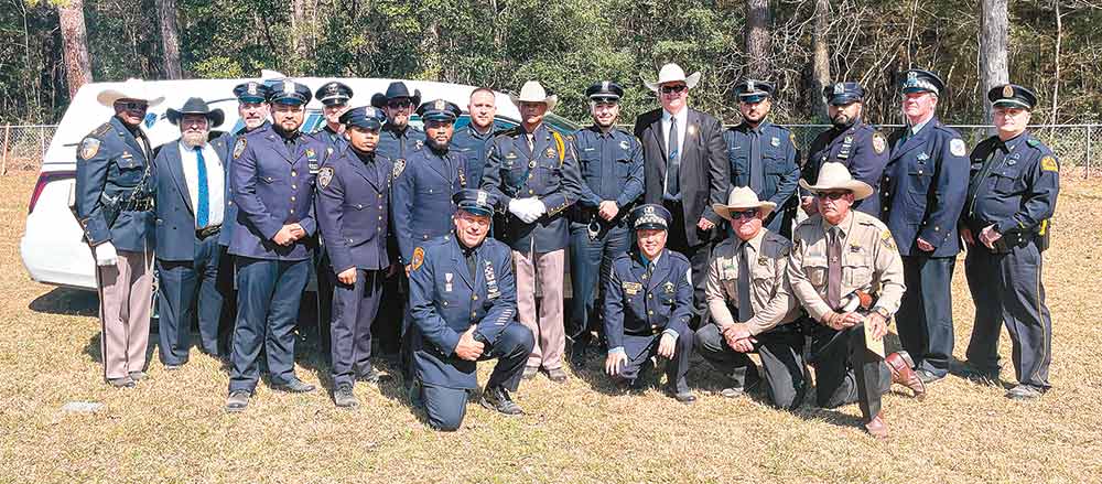 Law enforcement officials from around the country attend the funeral service for Deputy Neil Adams. Courtesy photo