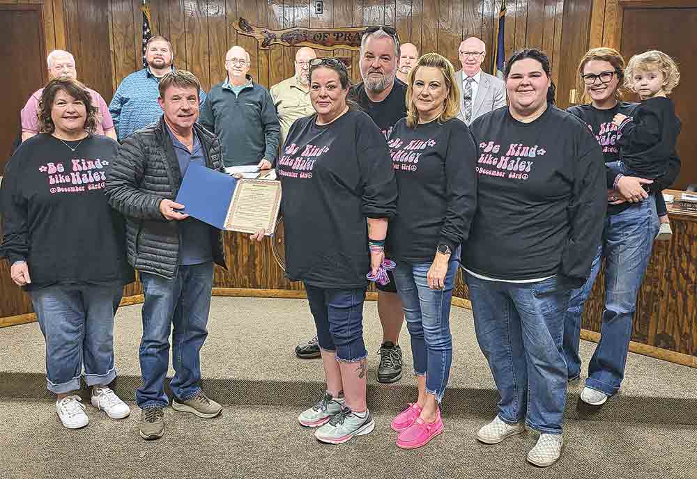 The Trinity City Council, led by Mayor Billy Goodin, presents representatives of the Haley Burk Memorial Foundation declaring Dec. 23 as Haley Burk Day, and asked everyone to “Be like Haley and perform a random act of kindness.” Photo by Tony Farkas