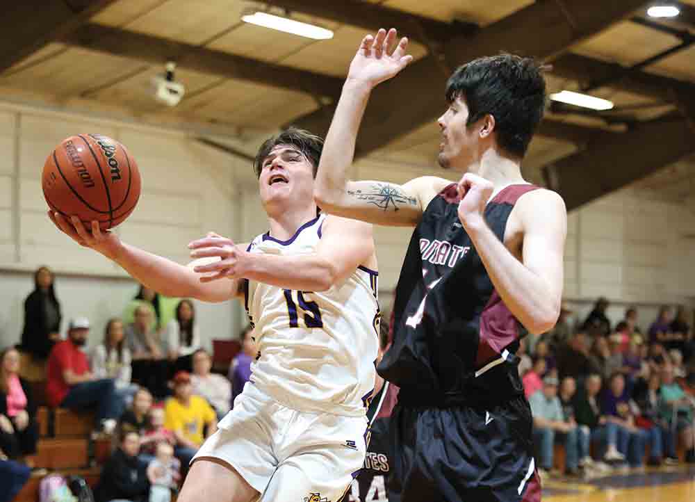 Jesse Bittick sinks a contested layup in the win against Spurger. BECKI BYRD | TCB