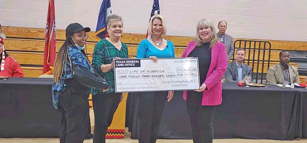 Pictured left-to-right: City of Woodville councilmember Paula Jones; city administrator Mandy Risinger; state land commissioner Dawn Buckingham and Woodville Mayor Amy Bythewood receive a check from the GLO. PHOTO COURTESY OF JOE BLACKSHER