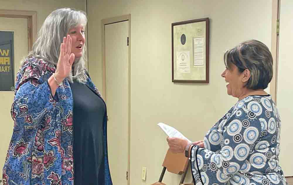 Darla Dear was sworn-in by Woodville City Secretary Terri Bible to serve as temporary municipal court judge.  MOLLIE LASALLE | TCB