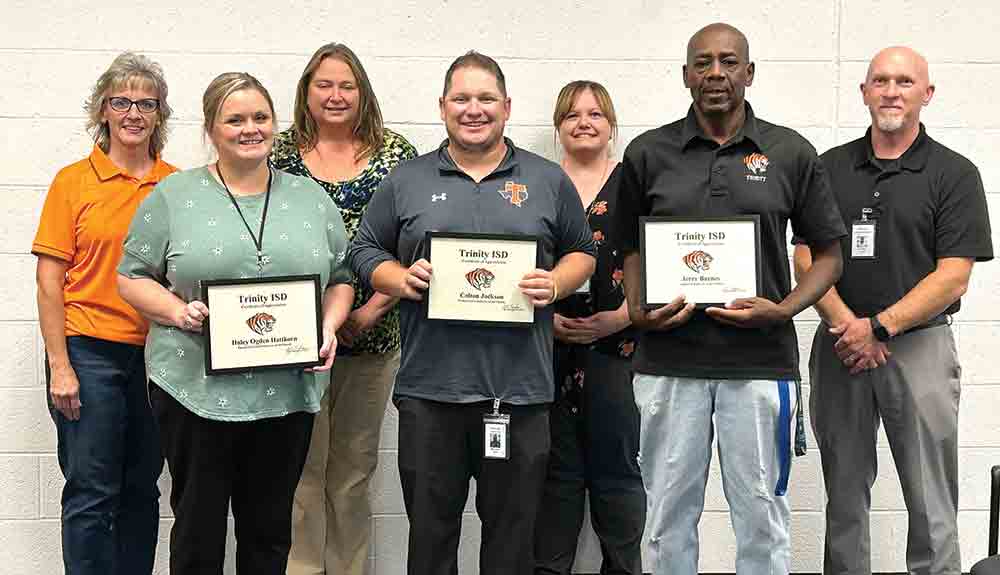 The Trinity ISD employees of the month for August are Haley Ogden Hatthorn, paraprofessional; Colton Jackson, professional; and Jerry Barnes, support. They are pictured with Elizabeth King, Gill Campbell, Brittaney Cassidy and Kent Copley. Trinity ISD awards each employee who wins a $100 check and a certificate. At the end of the school year, the winners go into a drawing for a chance to win $1,000. Courtesy photos
