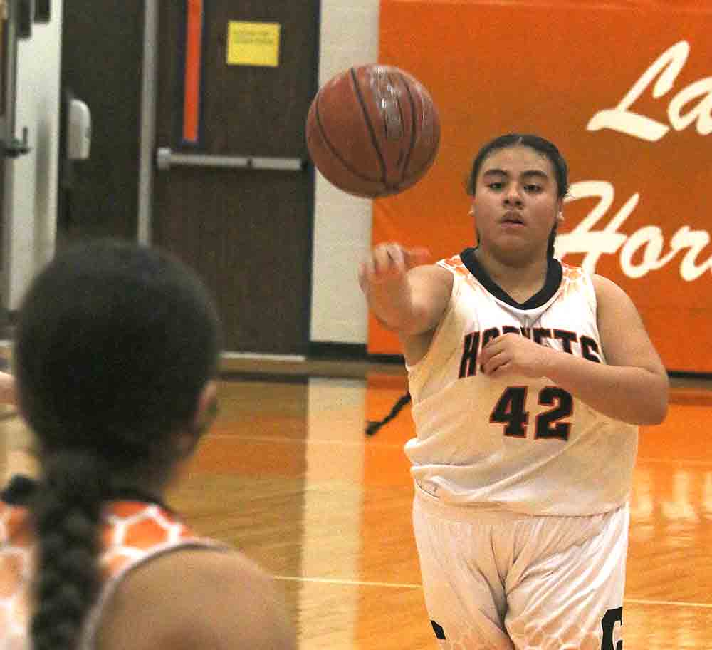 Giselle Martinez passes to a teammate.