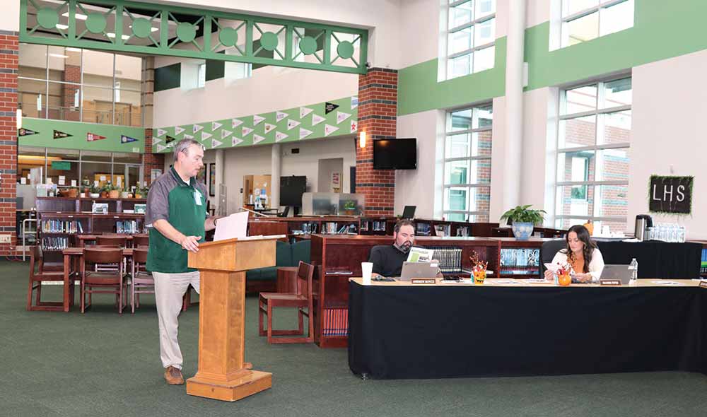 Livingston ISD superintendent Dr. Brent Hawkins presents the reports from the Superintendent’s Student Advisory Council and the Superintendent’s Personnel Advisory Committee meetings. COURTESY PHOTO