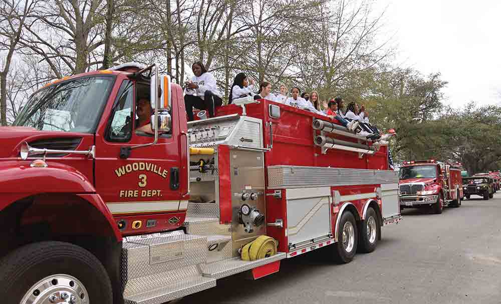 Firetrucks travel the parade route for the annual MLK Day Parade in Woodville.  BOOSTER FILE PHOTO BY DONNA HAMMER | TCB