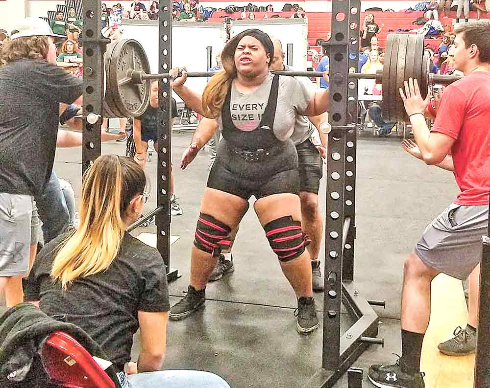 Reigning state champion Kailyn Fisher competes in the deadlift during Saturday’s powerlifting meet in Splendora.