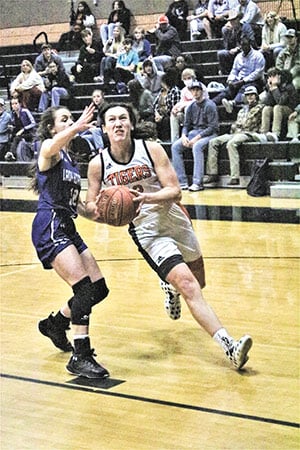 Lady Tiger Zoey Grey sets up for a layup during a Tuesday game against Hardin. 