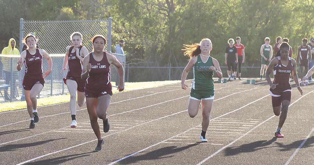 Lovelady's Mihyia Davis leads the pack down the stretch to victory in the girls 100-meter dash at the District 20-2A Track and Field Meet last week at Centerville. Also shown are Latexo's Charlee Biano (second place), Lovelady's Gracie McMahon (third), Grapeland's Sariyah Davis (fourth) and Lovelady's Morgan Womack (fifth).  LARRY LAMB | HCC