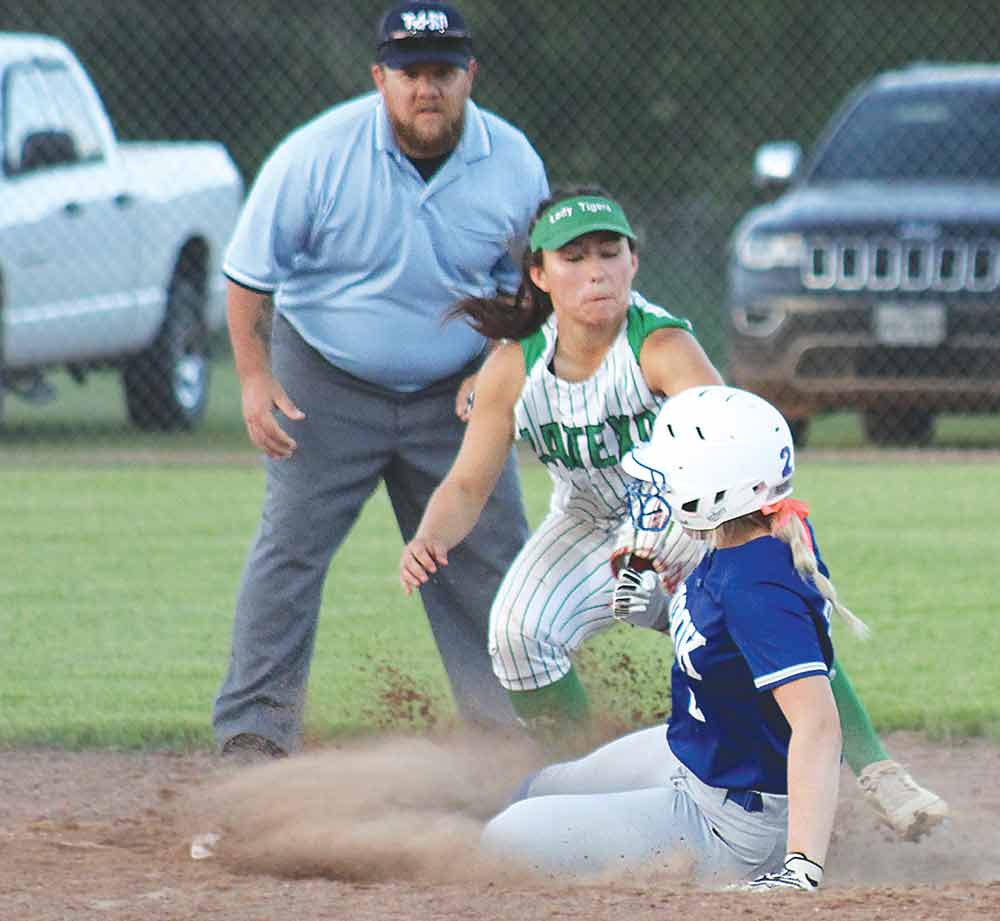 Latexo shortstop Charlee Biano tags a Snook runner at second in Game 1 of the bi-district series. LARRY LAMB |  HCC