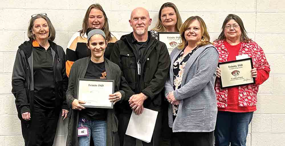 The Trinity ISD employees of the month were Cynthia Fuest, professional; Melissa Allbright, paraprofessional; and Melissa Martinez, support. Pictured are (from left) Judy Bishop, Gill Campbell, Melissa Martinez, Kent Copley, Melissa Allbright, Brittaney Cassidy and Cynthia Fuest.