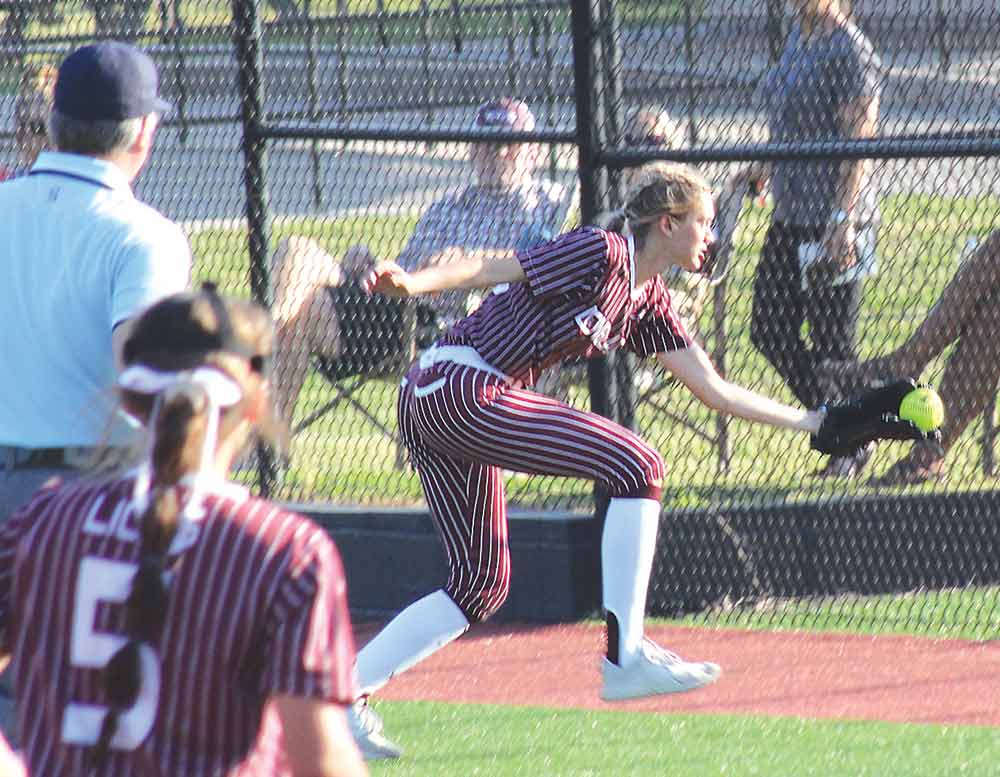 Lovelady's Shyanne Pipkin snags a fly ball in foul territory in the bi-district playoff series against Shelbyville last Thursday. LARRY LAMB |  HCC