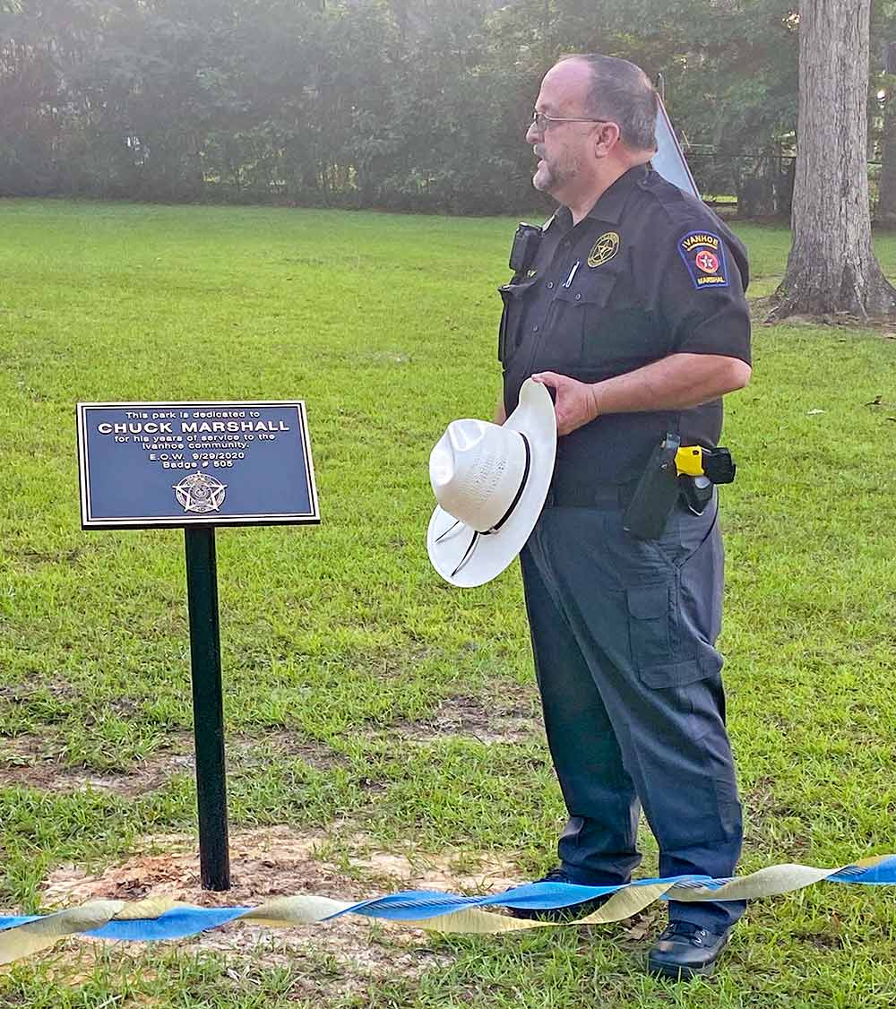 Ivanhoe City Marshal Terry Riley spoke about his late Deputy Marshal Chuck Marshall and helped to dedicate the Charmaine South Park to him. EMILY EDDINS | TCB