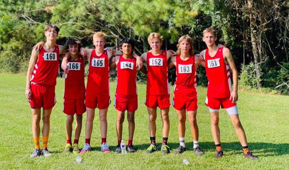 The varsity, JV and junior high boys cross country teams placed first in the Race to the Summit CC Meet in Woodville on Sept. 11.  (Courtesy Photos)