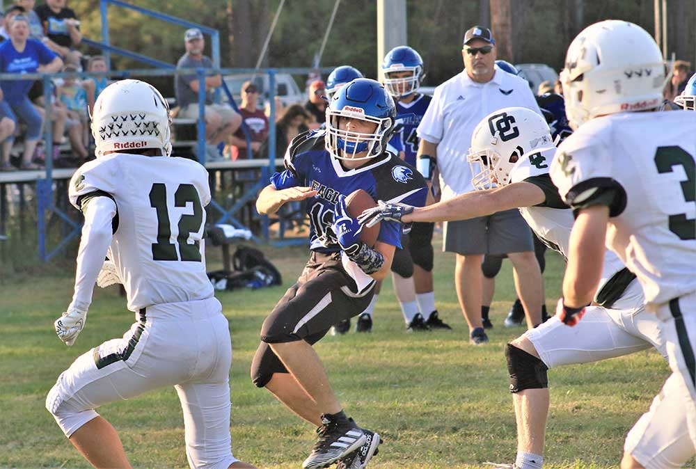 Apple Springs runner Dakota Campbell looks for room during the Eagles’ 48-0 loss to Ovilla Christian on Sept. 10. (Photo by Tony Farkas/TCNS)
